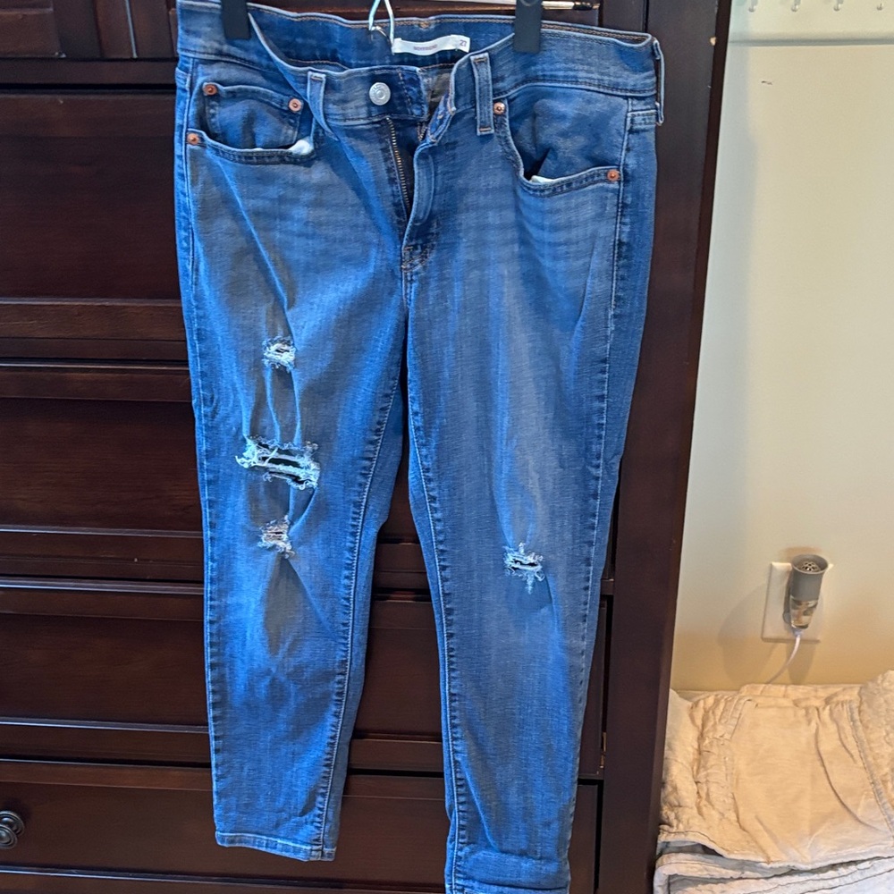 Distressed Levi’s Blue Jeans